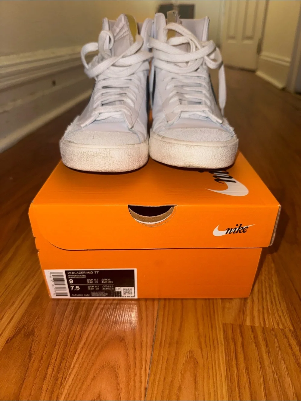 Nike Blazer Mid '77 white sneakers with black Nike swoosh